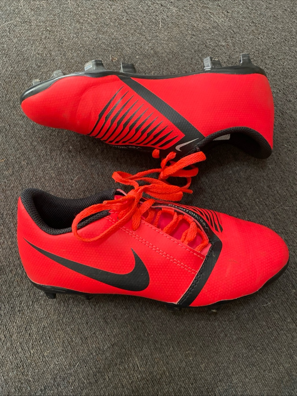 Nike Kids Bright Red Soccer Cleats with Black Swoosh